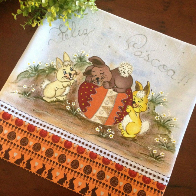 Pintura de coelhos em pano de prato